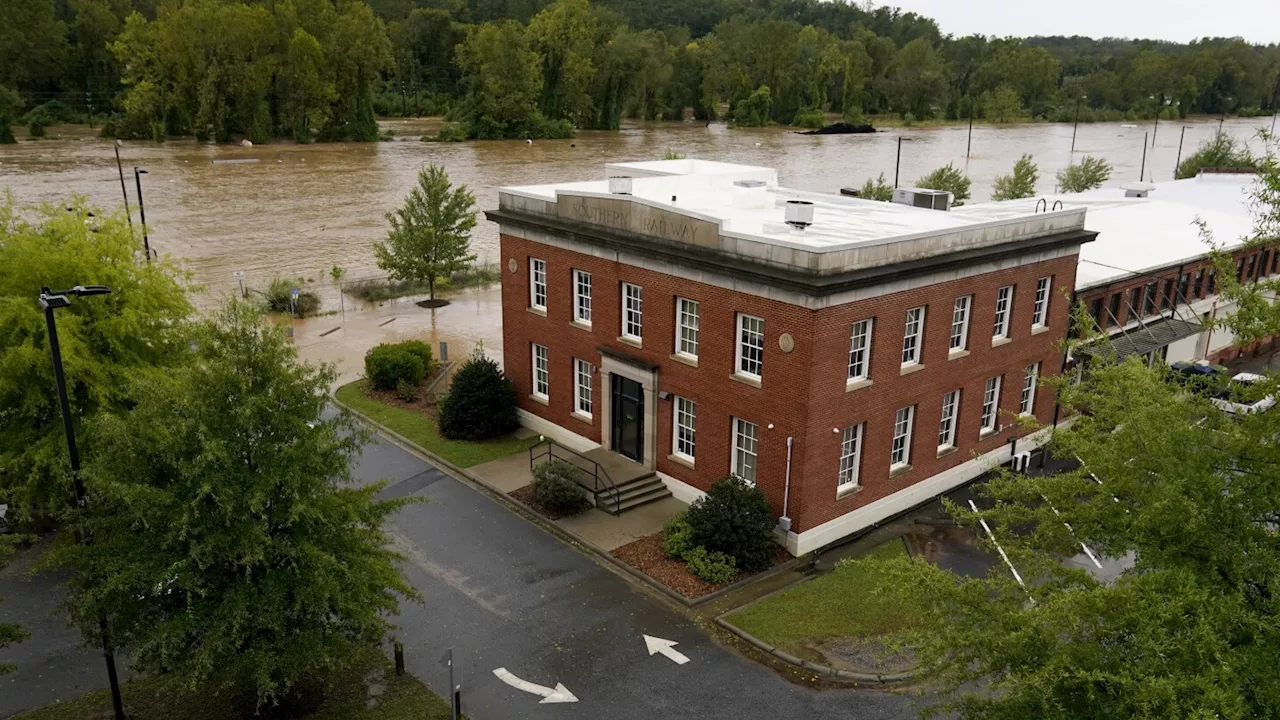 Torrential rains flood North Carolina mountains and create risk of dam failure