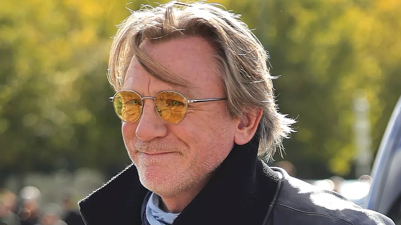 Daniel Craig turns heads in another quirky colourful ensemble at PFW