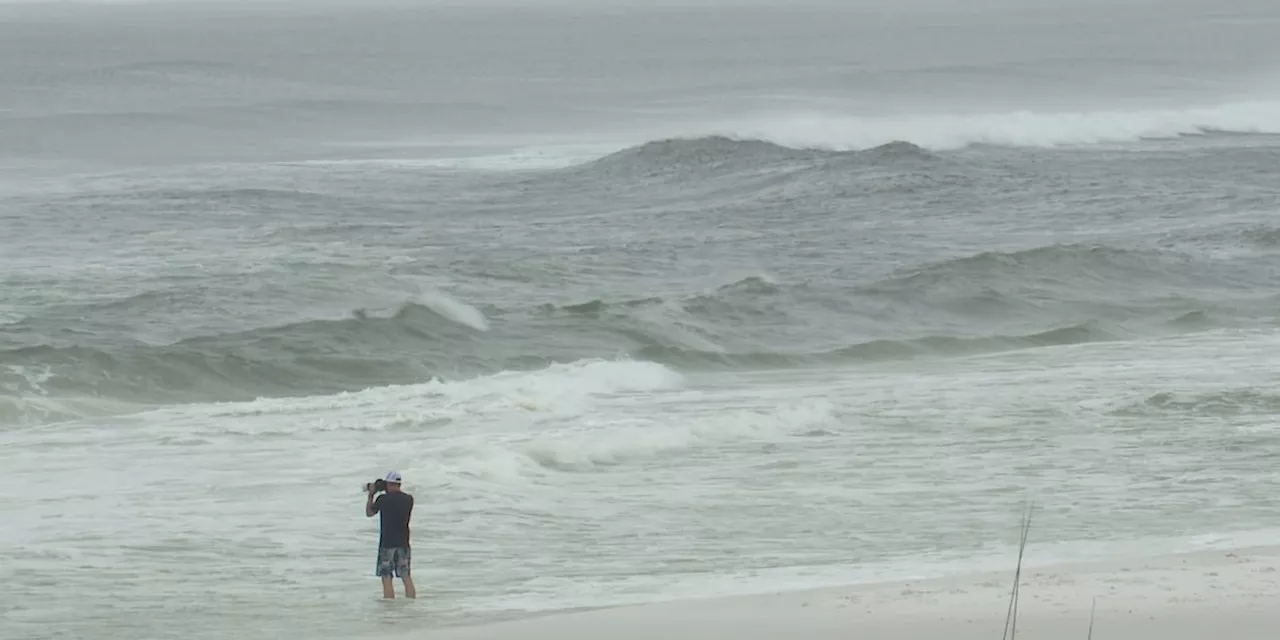 Helene evacuees take to Miramar Beach while keeping track of conditions back home