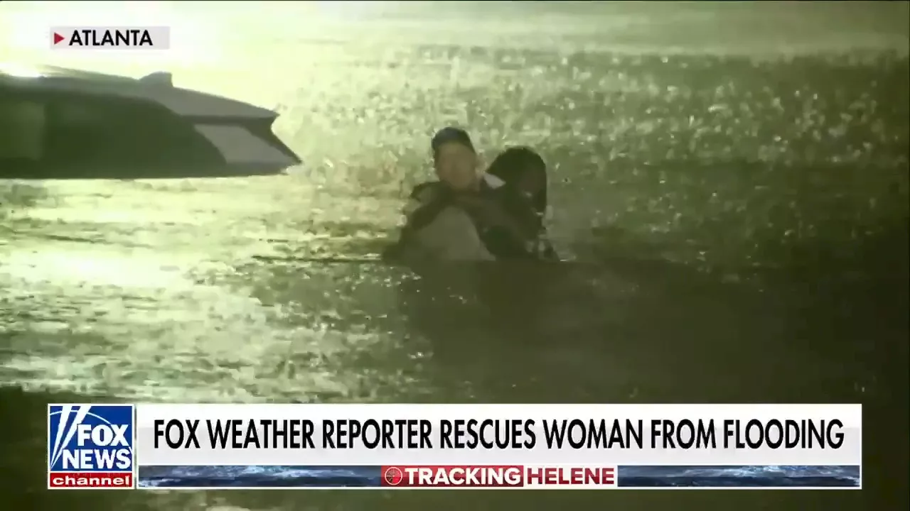 Fox Weather Meteorologist Rescues Woman From Rising Floodwaters During Live Shot