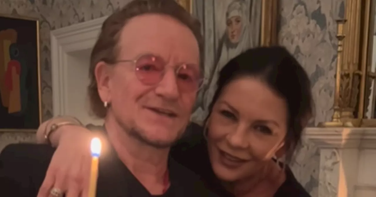 Bono serenades Catherine Zeta Jones and Michael Douglas on Dublin birthday bash