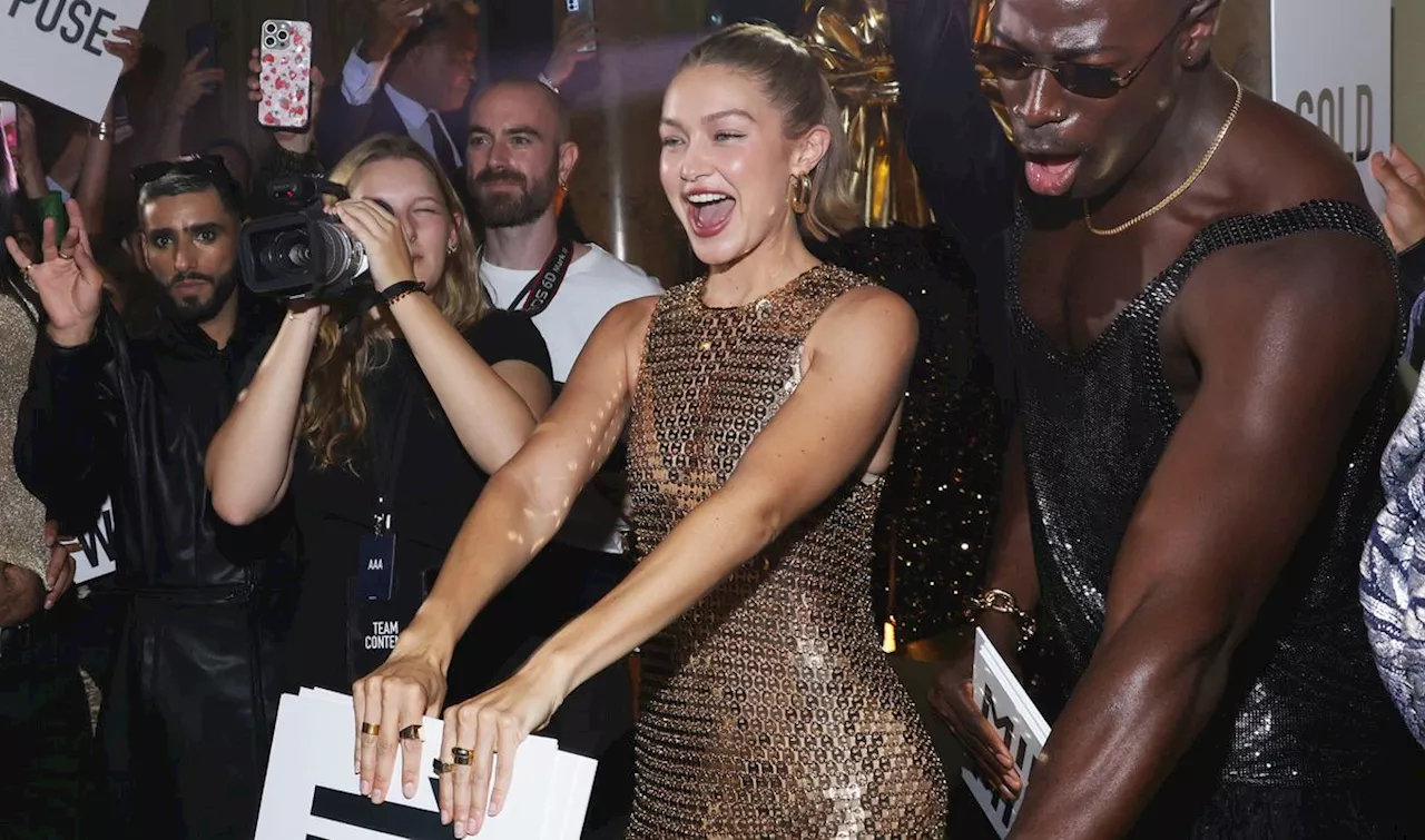 Gigi Hadid Matches Her Naked Manicure to Her Gold Naked Dress at Paris Fashion Week