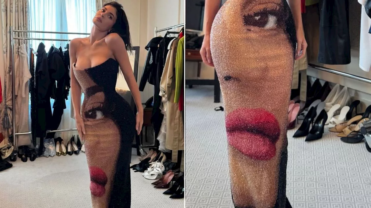 Kylie Jenner Wears Her Own Face on a Beaded Strapless Balmain Gown at Paris Fashion Week