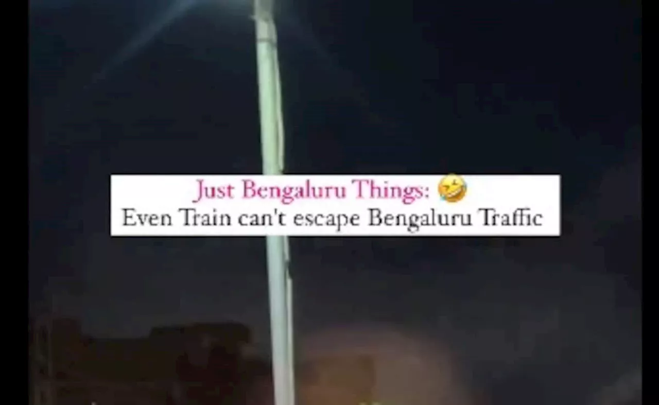 Bengaluru Train Viral Video: जब ट्रैफिक में फंसी ट्रेन तो लोग हुए हैरान, सोशल मीडिया पर वायरल हुआ वीडियो तब रेलवे ने बताई सच्चाई