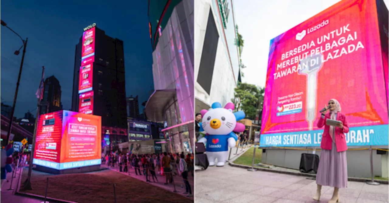 Huge Crowd Seen Gathering Around Lot 10's Billboard Screen. Here's What Actually Happened