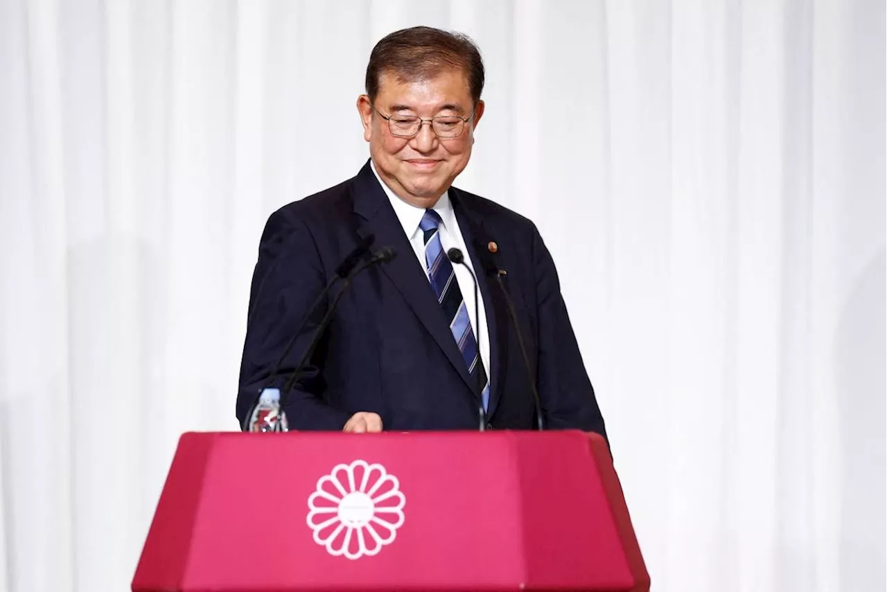 Former defense minister elected as Japan's new PM