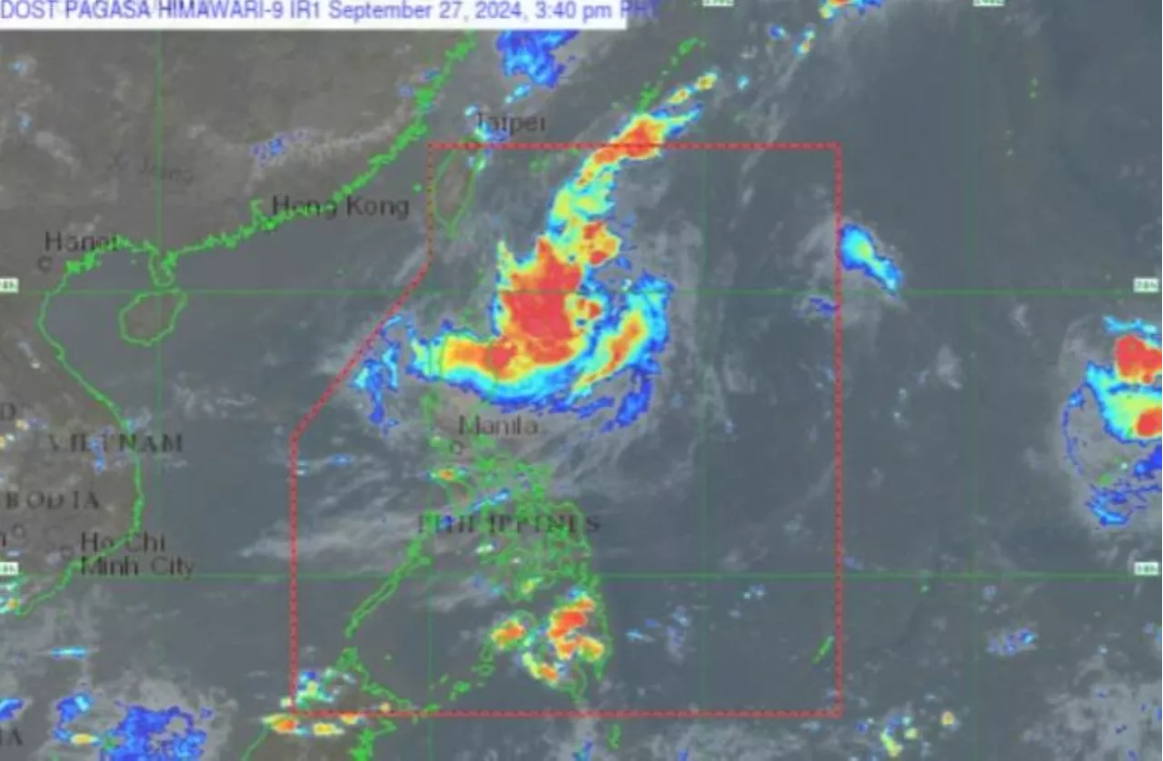 Tropical Depression Julian nearly stationary over PH Sea