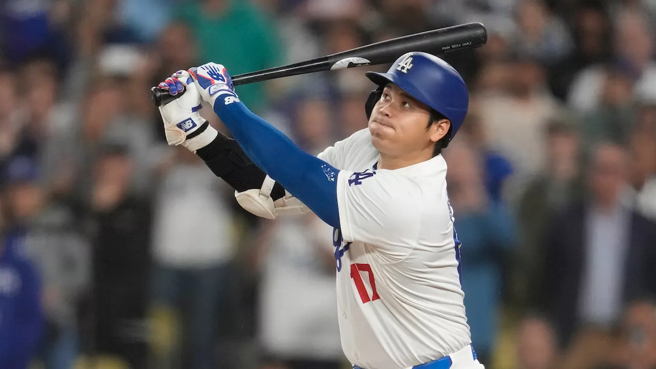 Dodgers win NL West title with win over Padres after 5-run rally in 7th inning