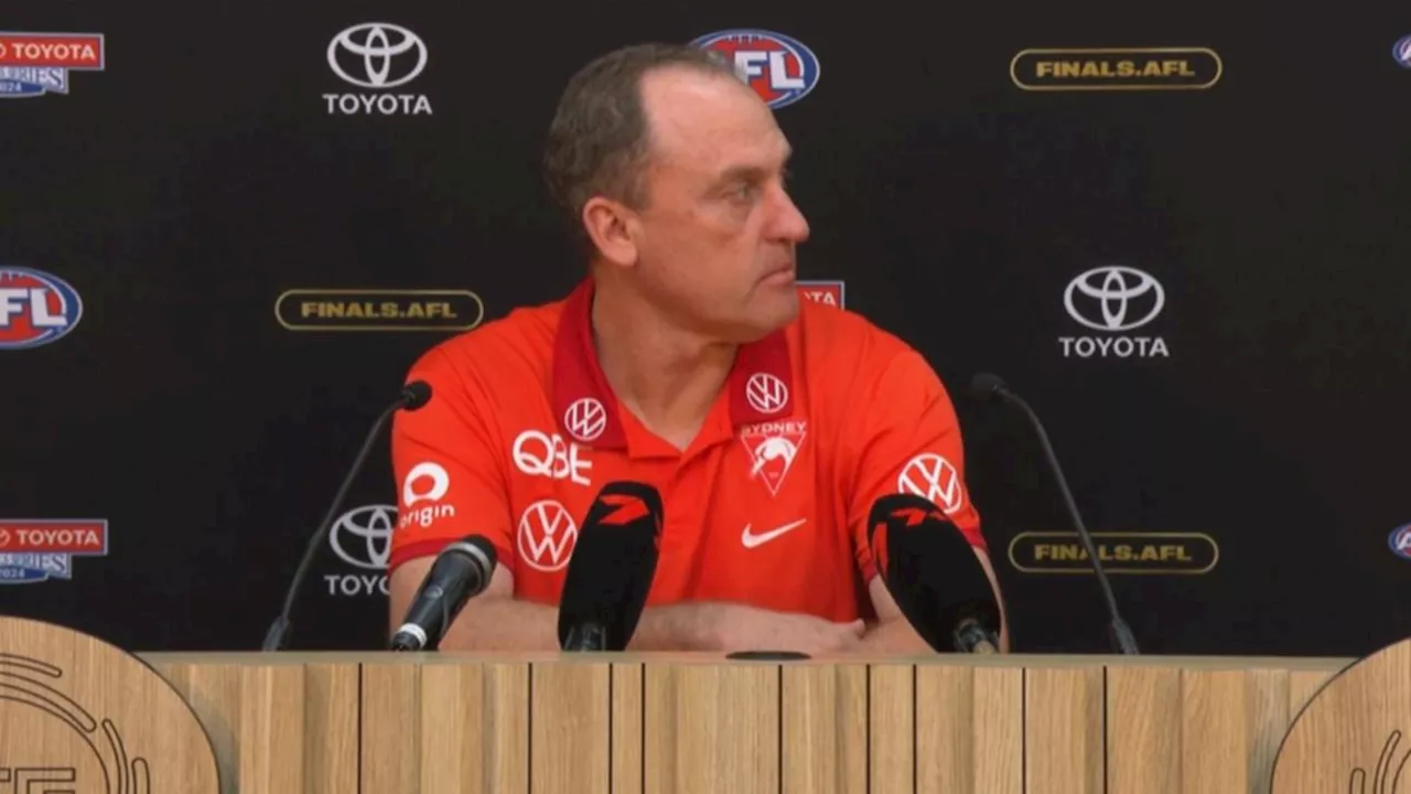 Brisbane celebrations interrupt John Longmire's post-match press conference