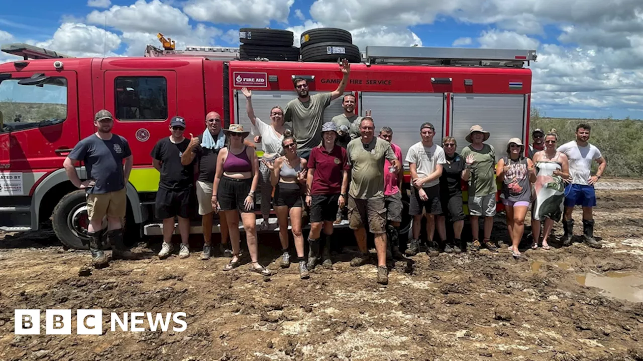 Emergency services aid convoy rescued after rainstorm ruins roads