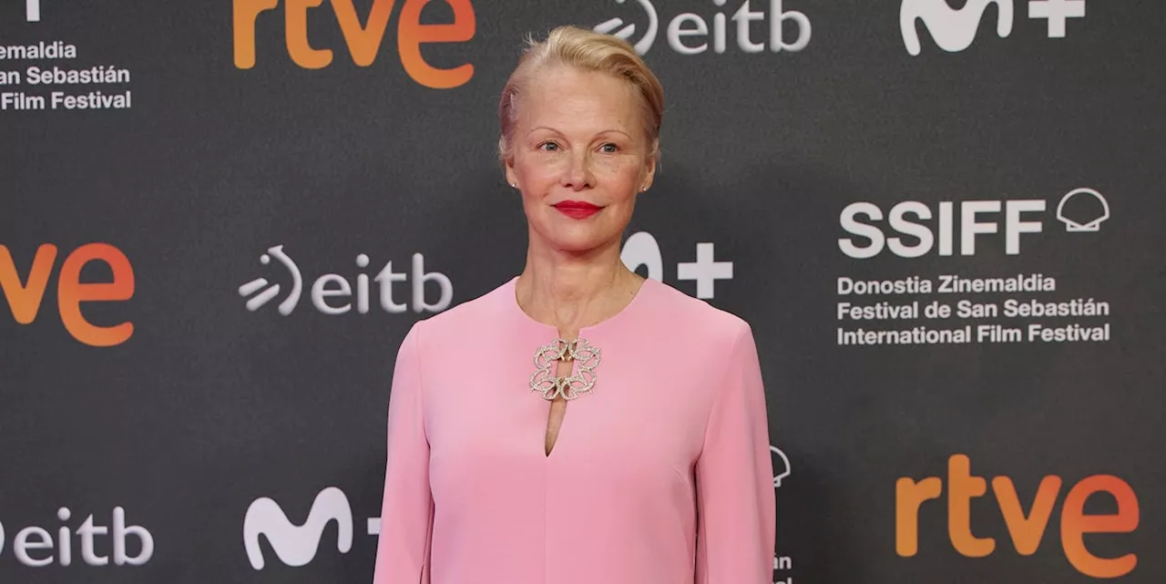 Pamela Anderson Debuts a Hot Pink Hairstyle with an Elegant Matching Gown