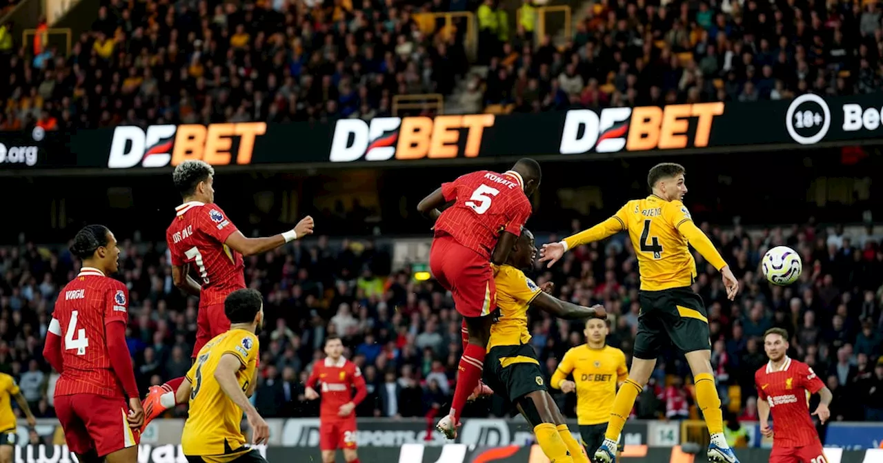 Liverpool go top of the Premier League after win at Wolves