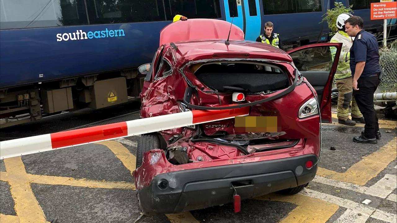 Driver Narrowly Avoids Death in Train Collision at Level Crossing