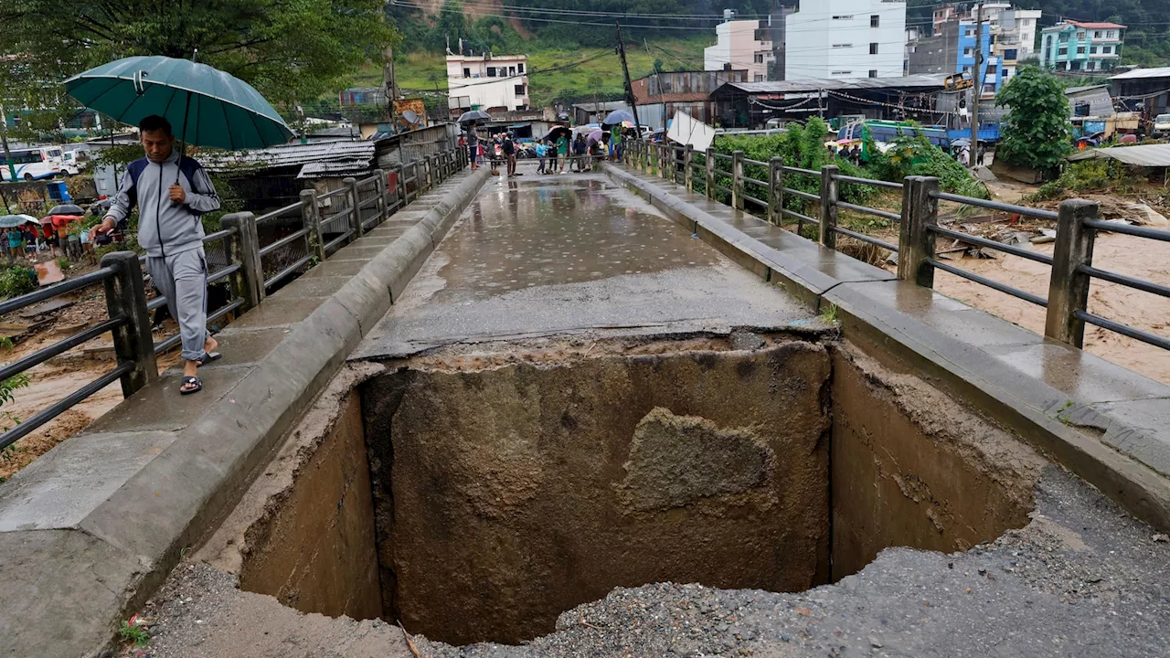 Death toll in Nepal flooding and landslides reaches at least 100, with dozens still missing