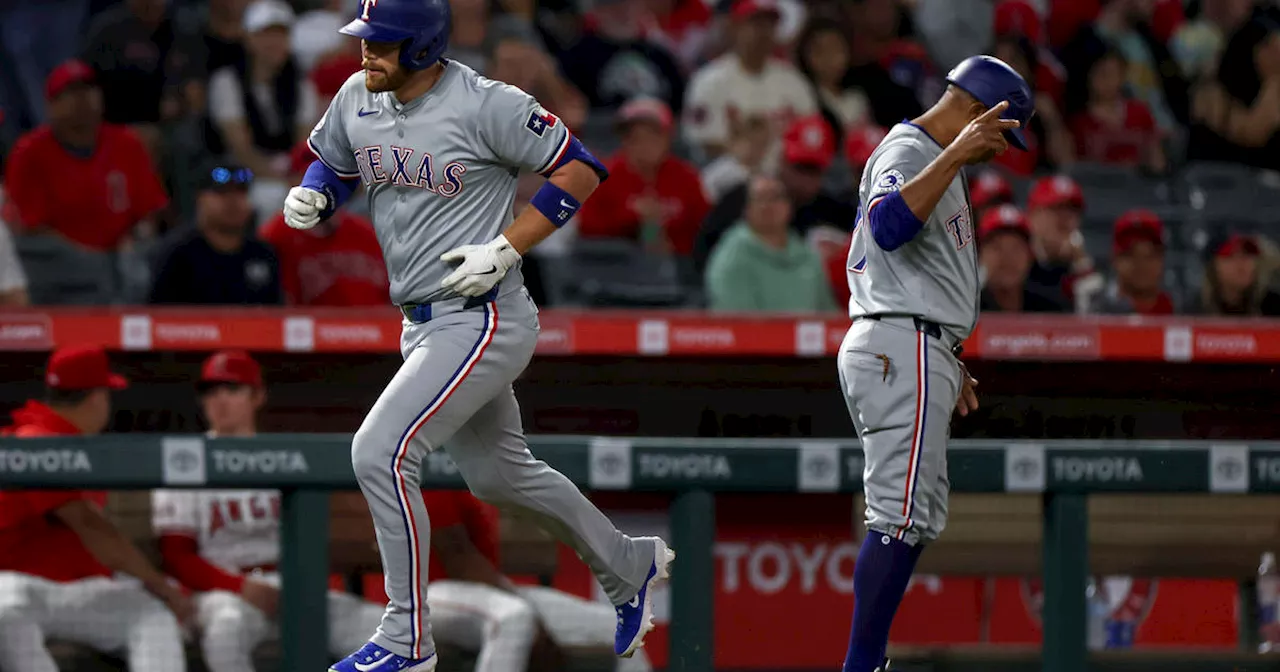 Jacob deGrom pitches 4 solid innings and the Texas Rangers hit 4 homers in a 5-2 win over the Angels