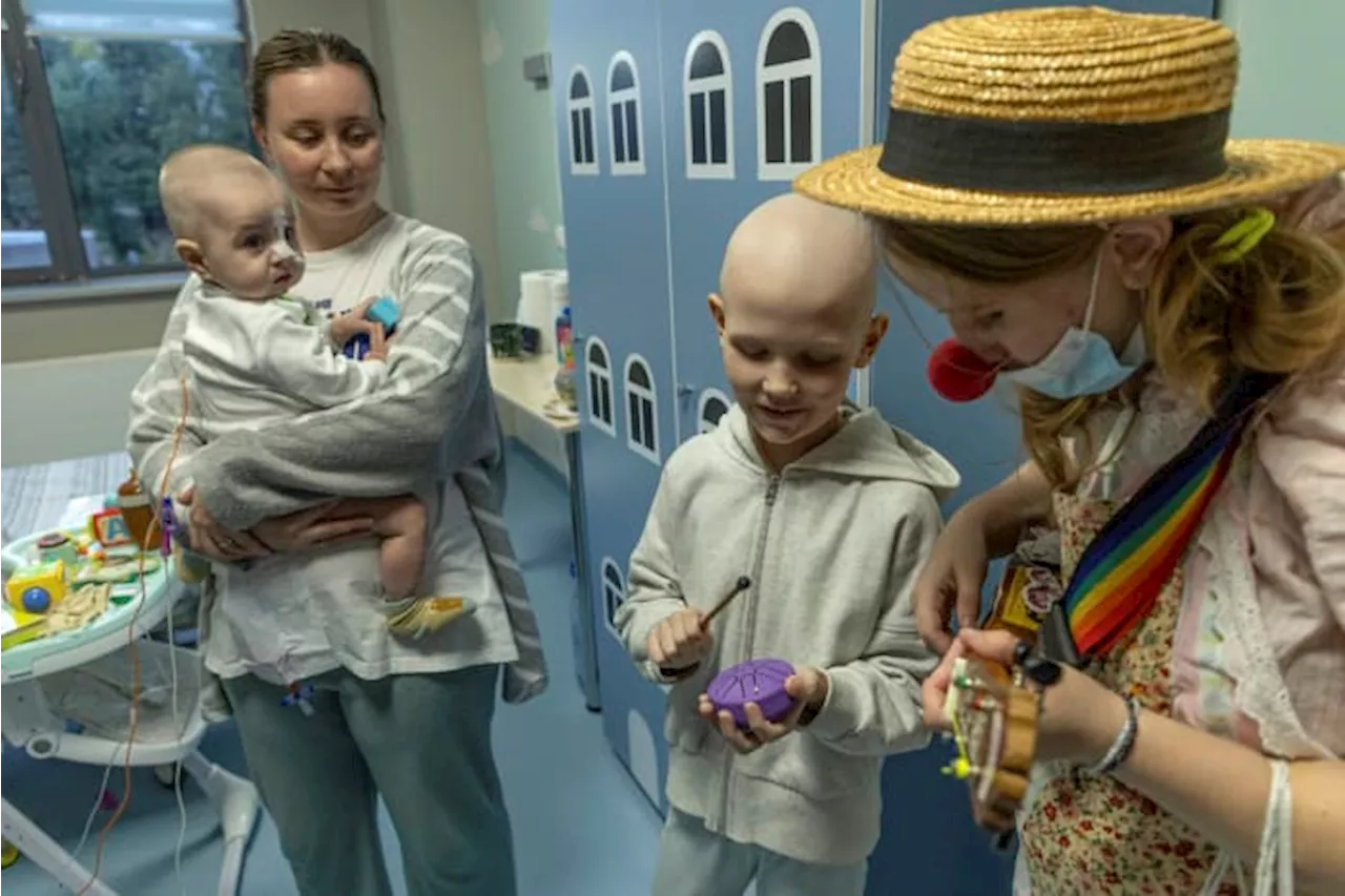 Hospital clowns bring joy to young Ukrainian cancer patients who survived Russian missile attack