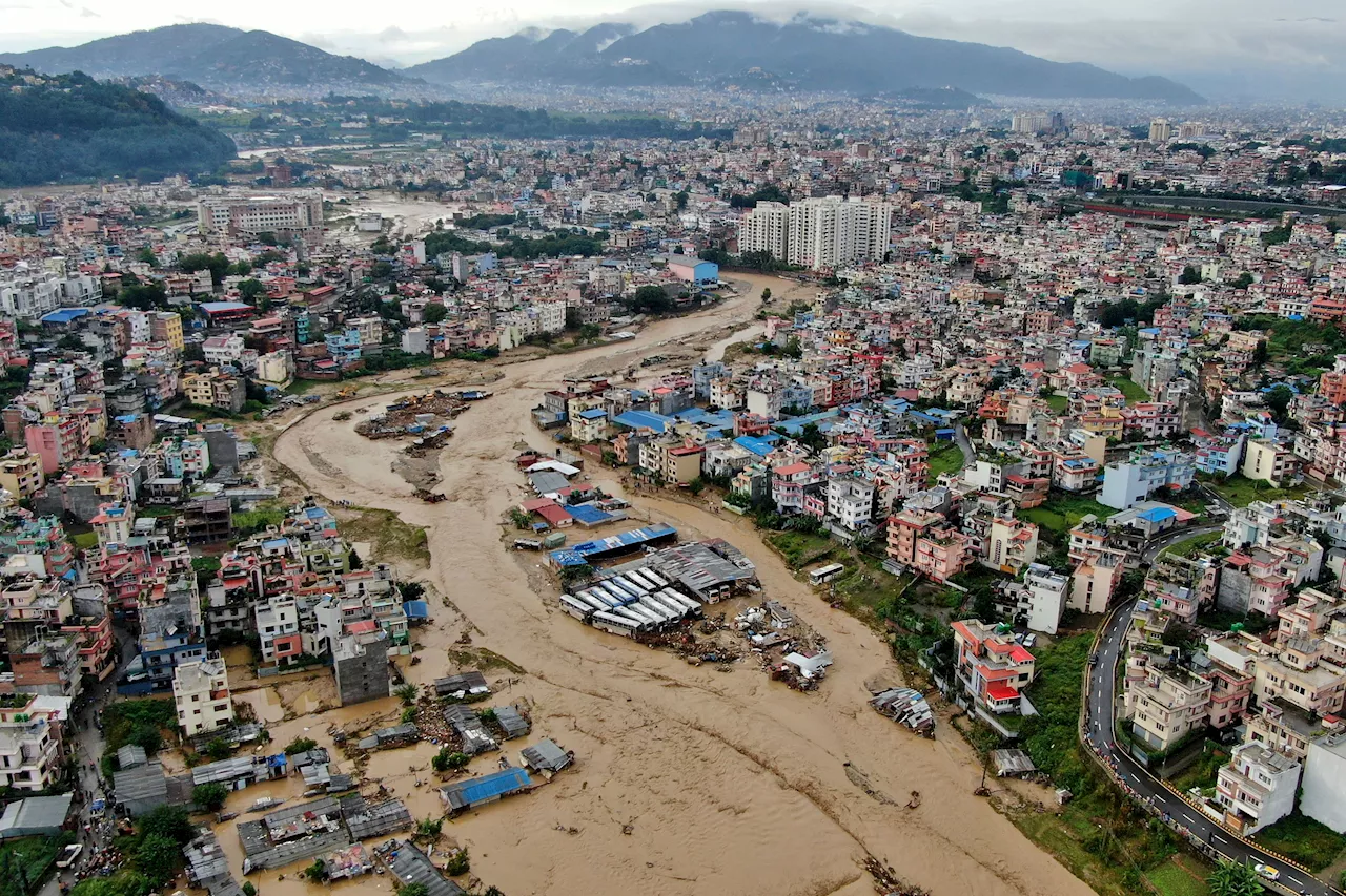 Flooding and landslides in Nepal kill at least 66 people, with as many again still missing