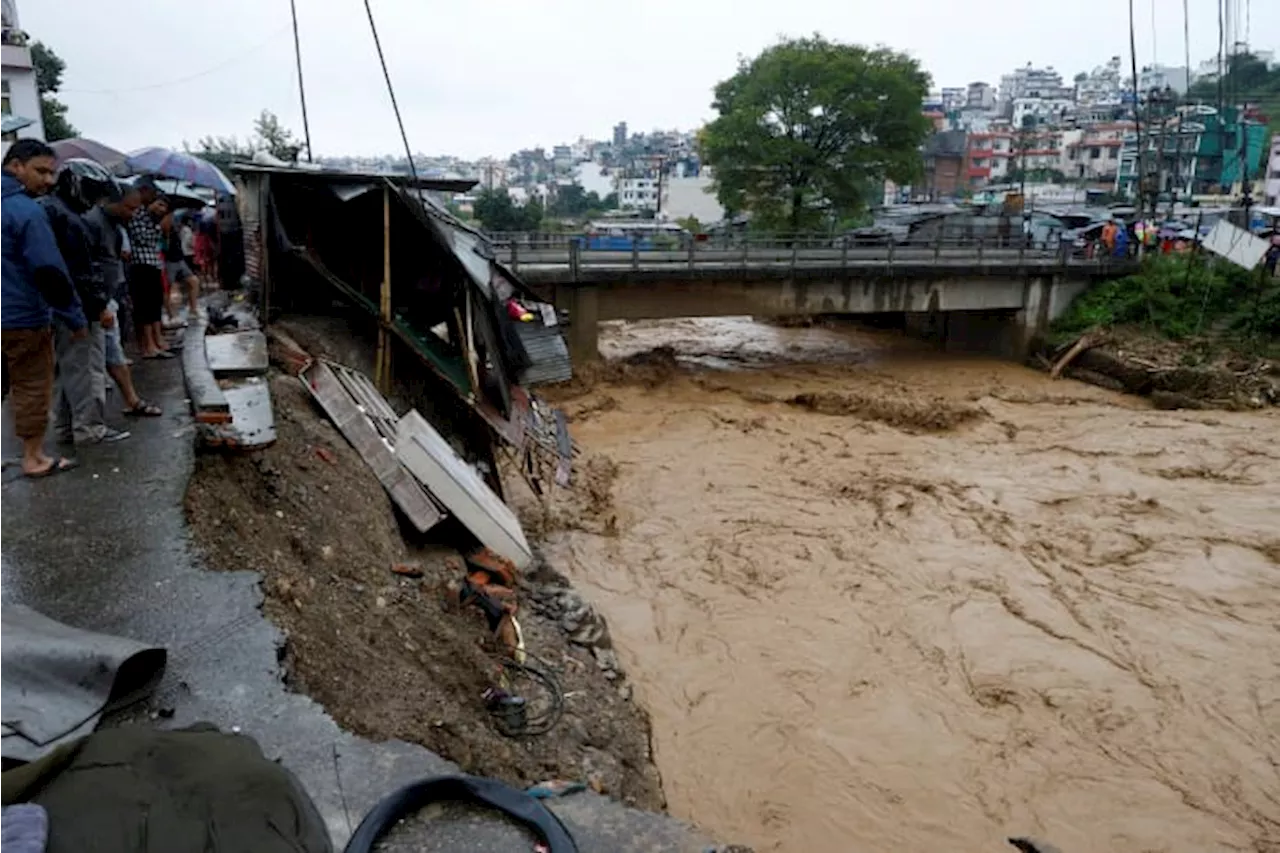 Death toll in Nepal flooding and landslides reaches at least 100, with dozens still missing