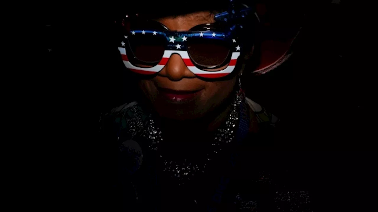 Using some ingenuity with a flash, an AP photographer gets to the red, white and blue of a portrait