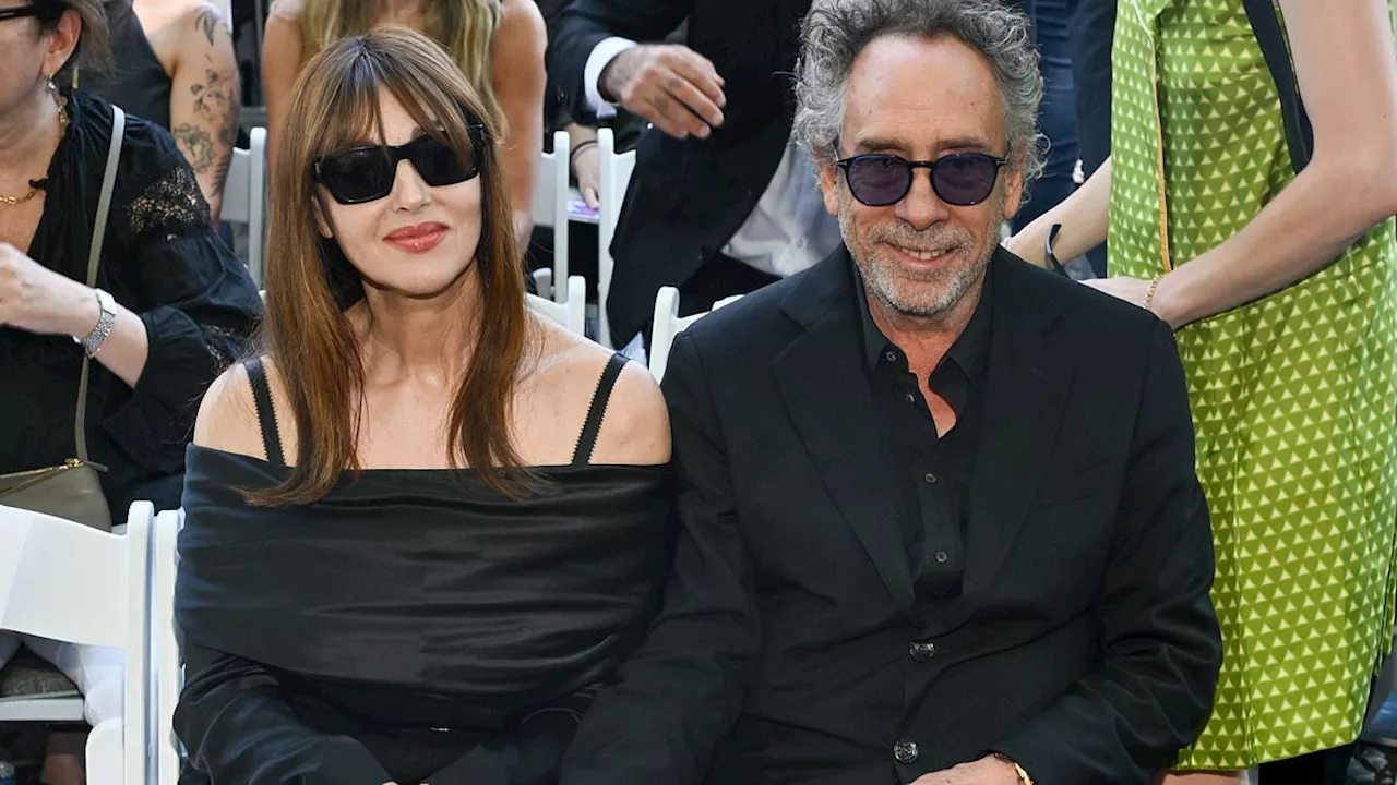 Tim Burton and Monica Bellucci hold hands at Hollywood Walk Of Fame