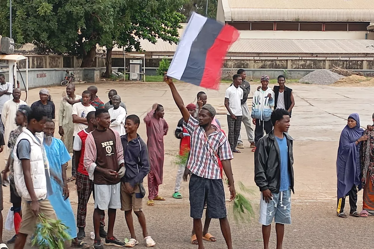 In West Africa, demonstrators wave Russian flags to protest poverty