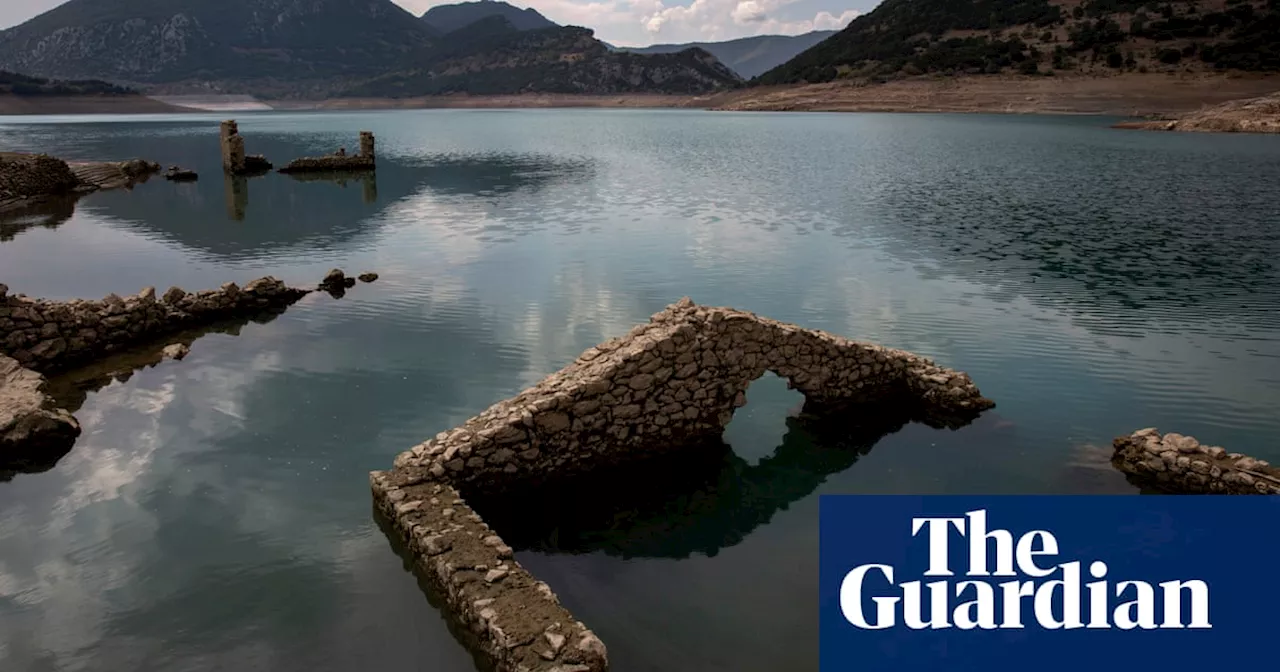 Re-emergence of Greece’s sunken village shows extent of rainfall crisis