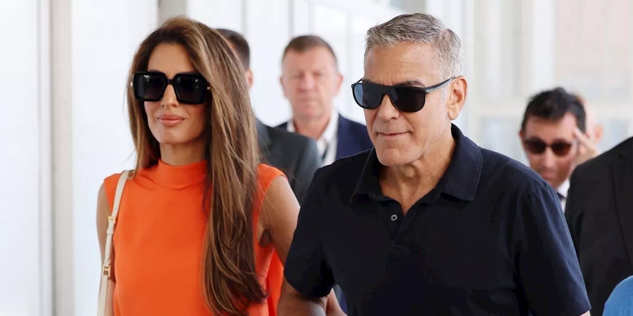 Amal Clooney's Neon Orange Jumpsuit in Venice Is So Aperol Spritz-Coded