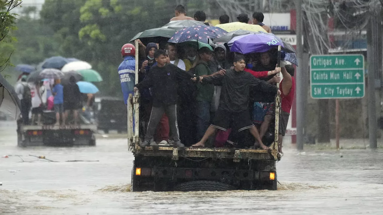 Tropical storm leaves at least 14 dead in the Philippines