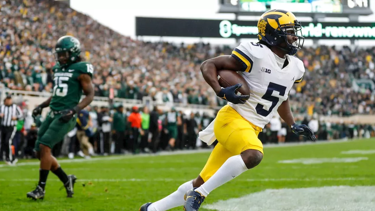 Michigan alumni came at Michigan State before Wolverines endured own