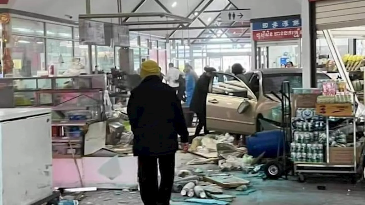 Two injured as car ploughs through Melbourne shopping centre