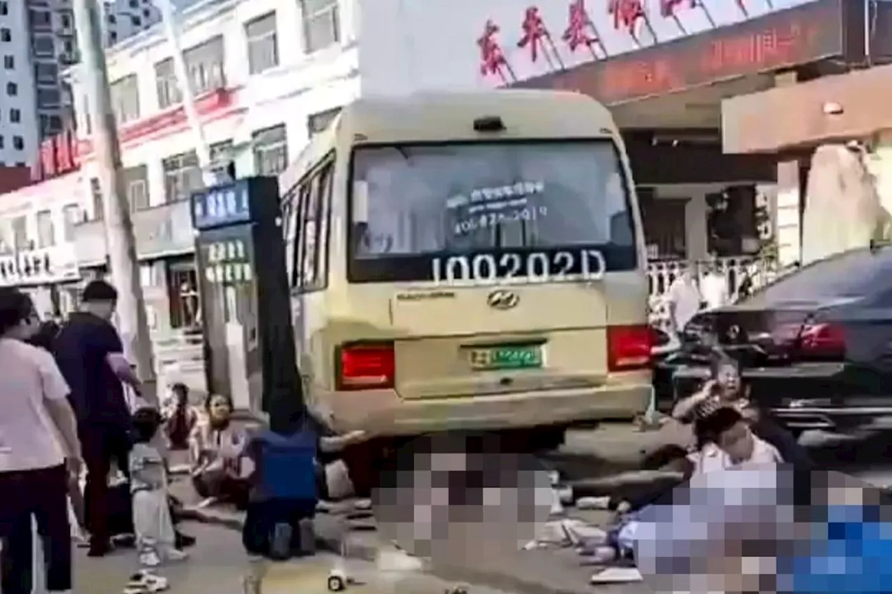 China school bus crashes into crowd, kills 11 including five students and six parents