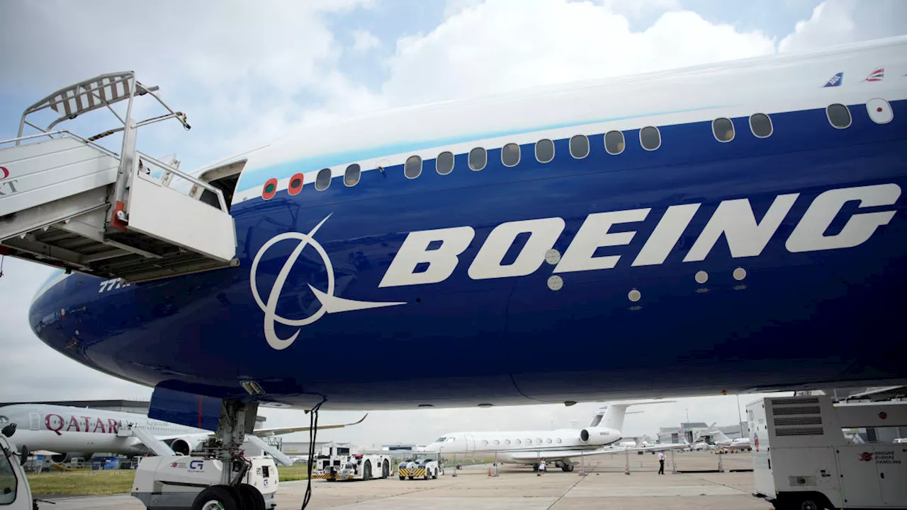 Boeing stock dips on Wells Fargo downgrade, price cut