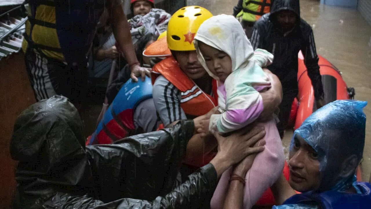 Schools close across Nepal after devastating floods and landslides kill at least 170 people