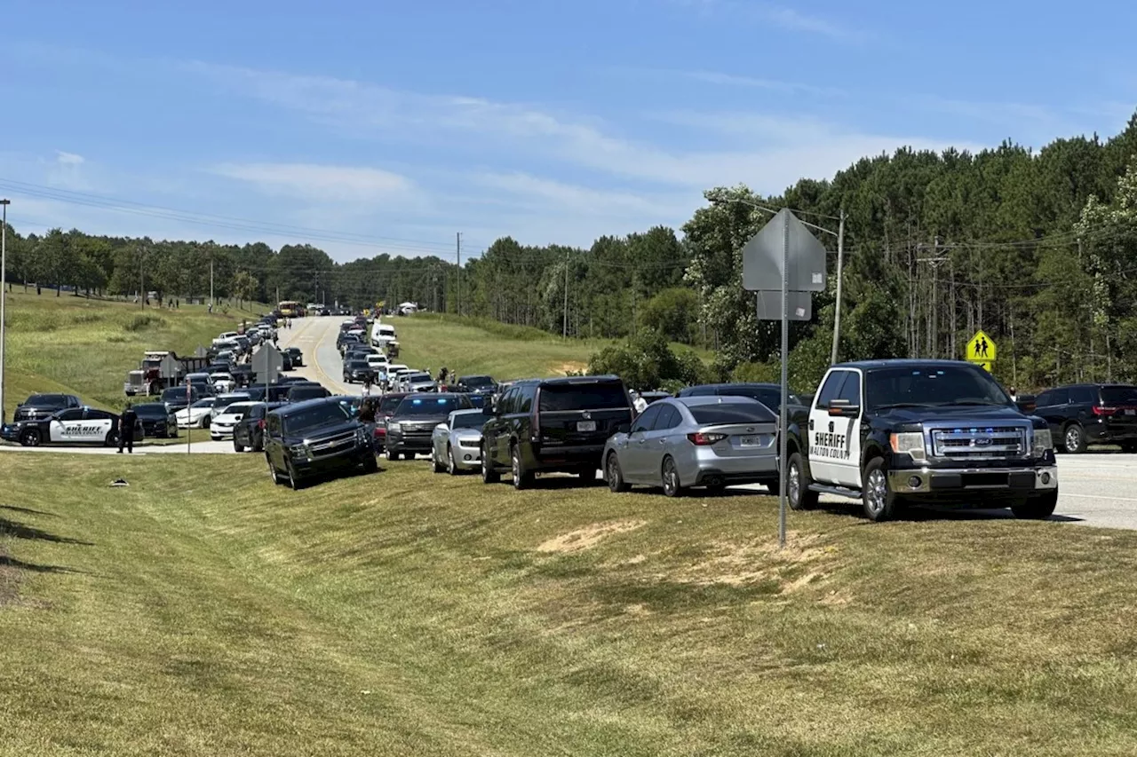 4 dead, at least 9 injured in shooting at high school near Atlanta, authorities say