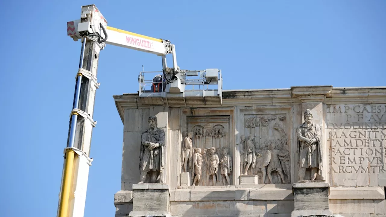 Lightning damages Rome's ancient Constantine Arch during a violent thunderstorm