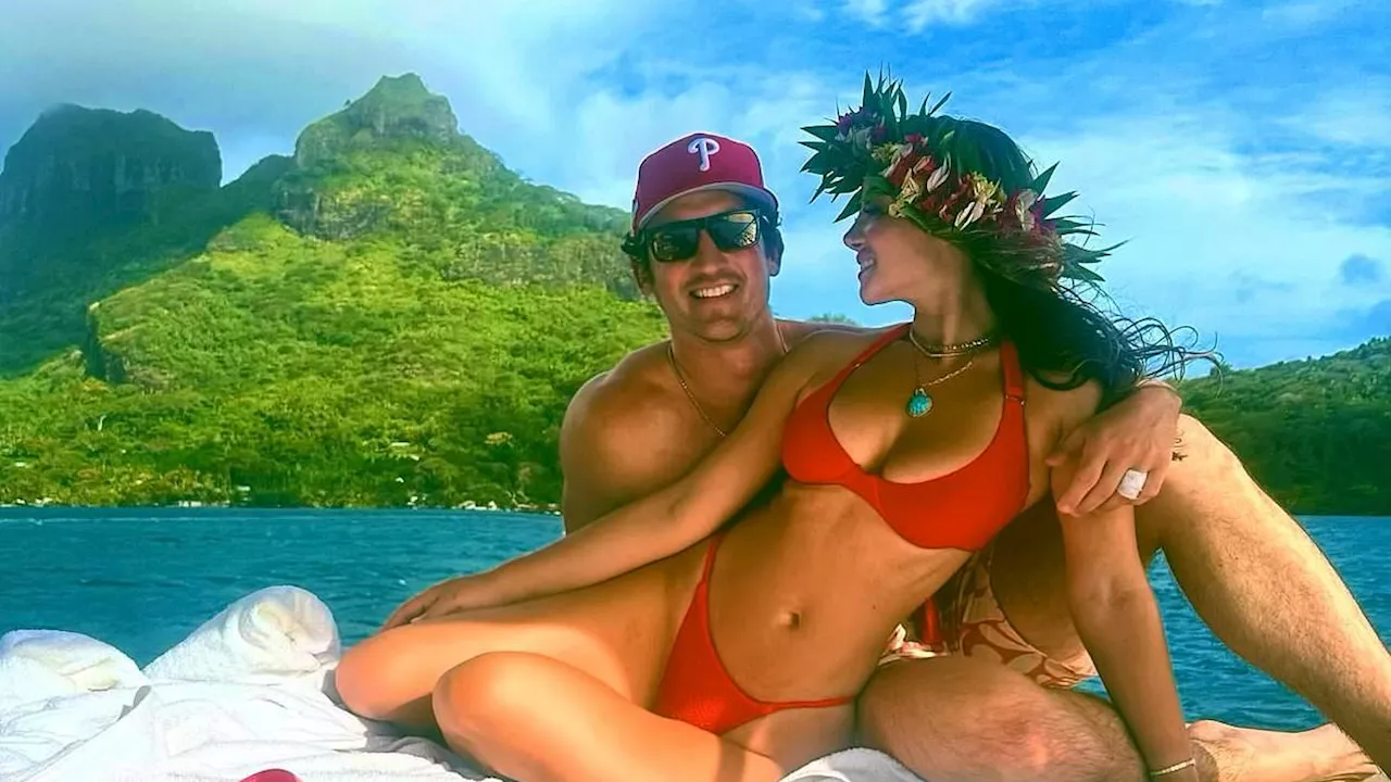 Miles Teller's wife Keleigh slips into a bikini for a loved-up snapshot from their anniversary trip...