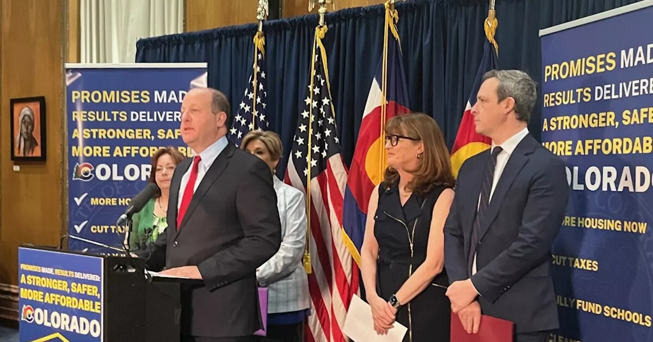 Gov. Jared Polis signs property tax compromise bill after conservative group pulls ballot initiatives