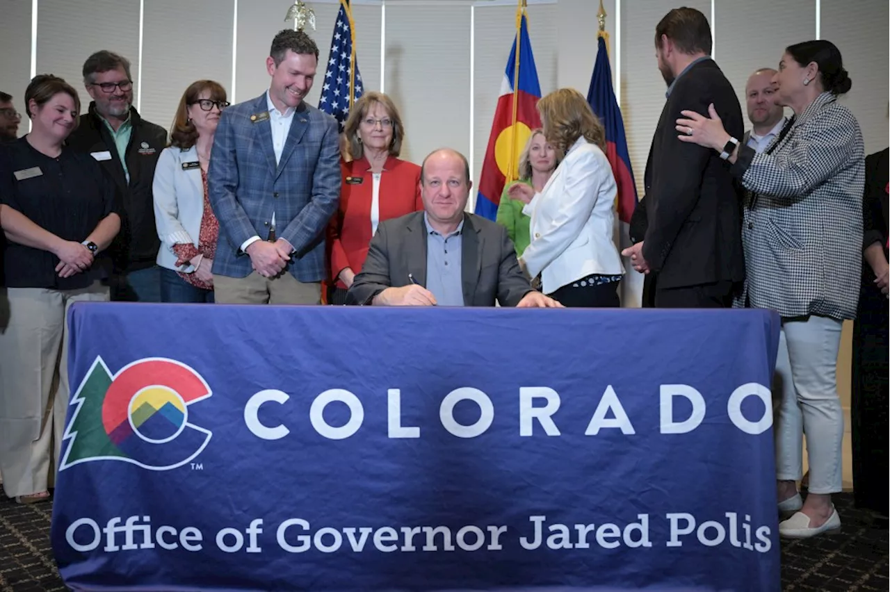 Gov. Jared Polis signs property tax compromise bill after conservative group pulls ballot initiatives