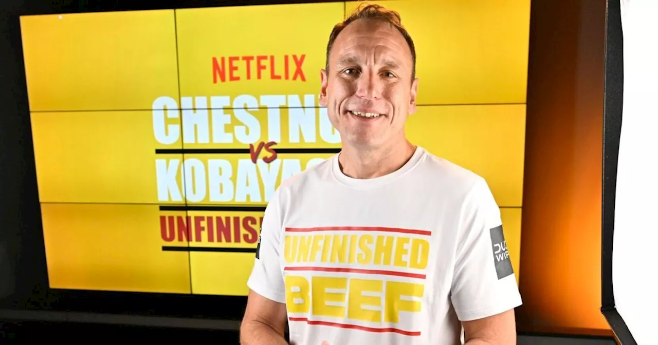 Joey Chestnut breaks own world record in Netflix’s hot dog eating showdown