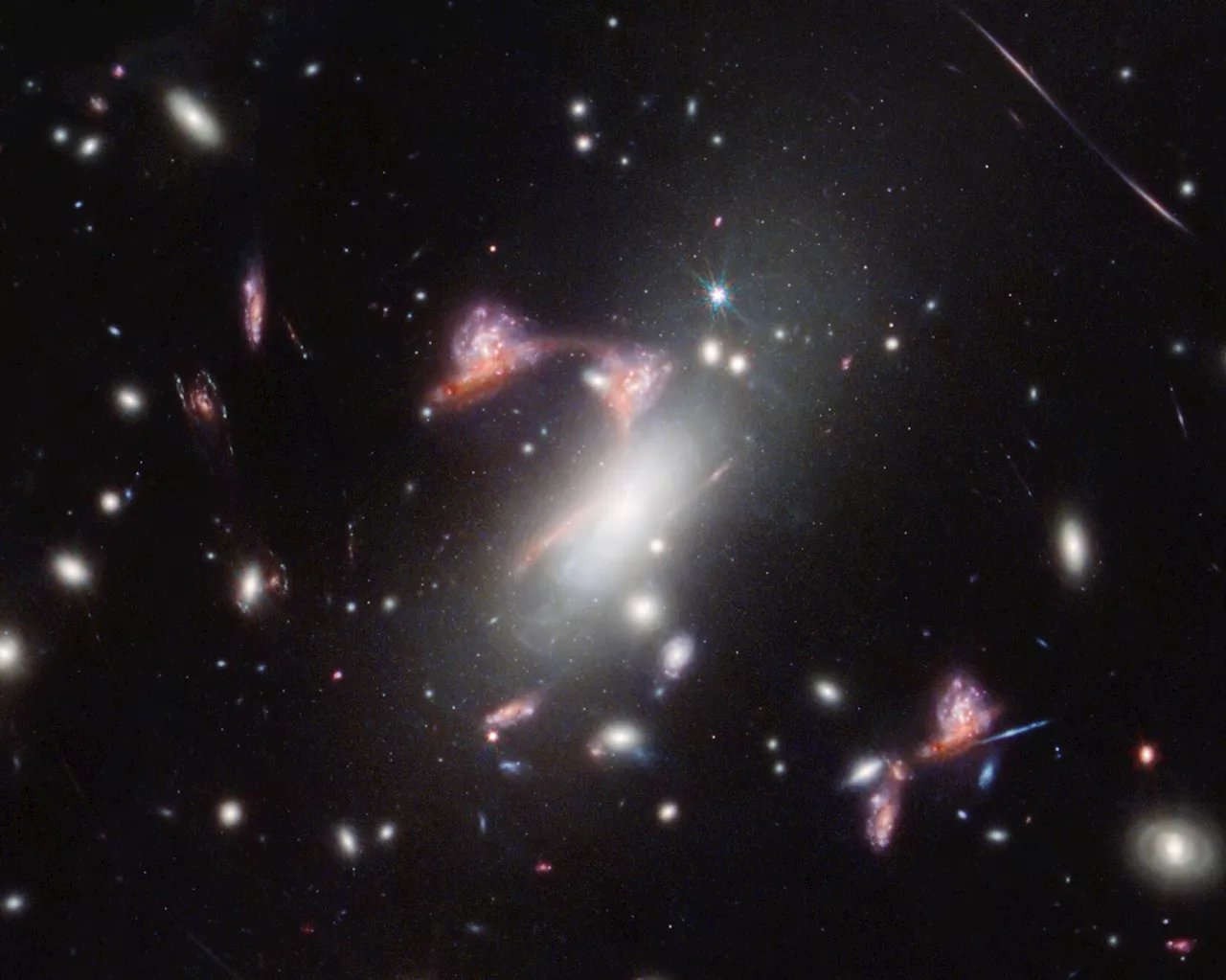 Webb reveals distorted galaxy forming cosmic question mark