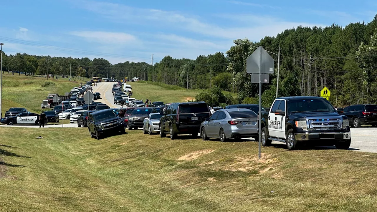 Two students and two teachers killed in Georgia school shooting - as 14-year-old suspect Colt Gray held by police