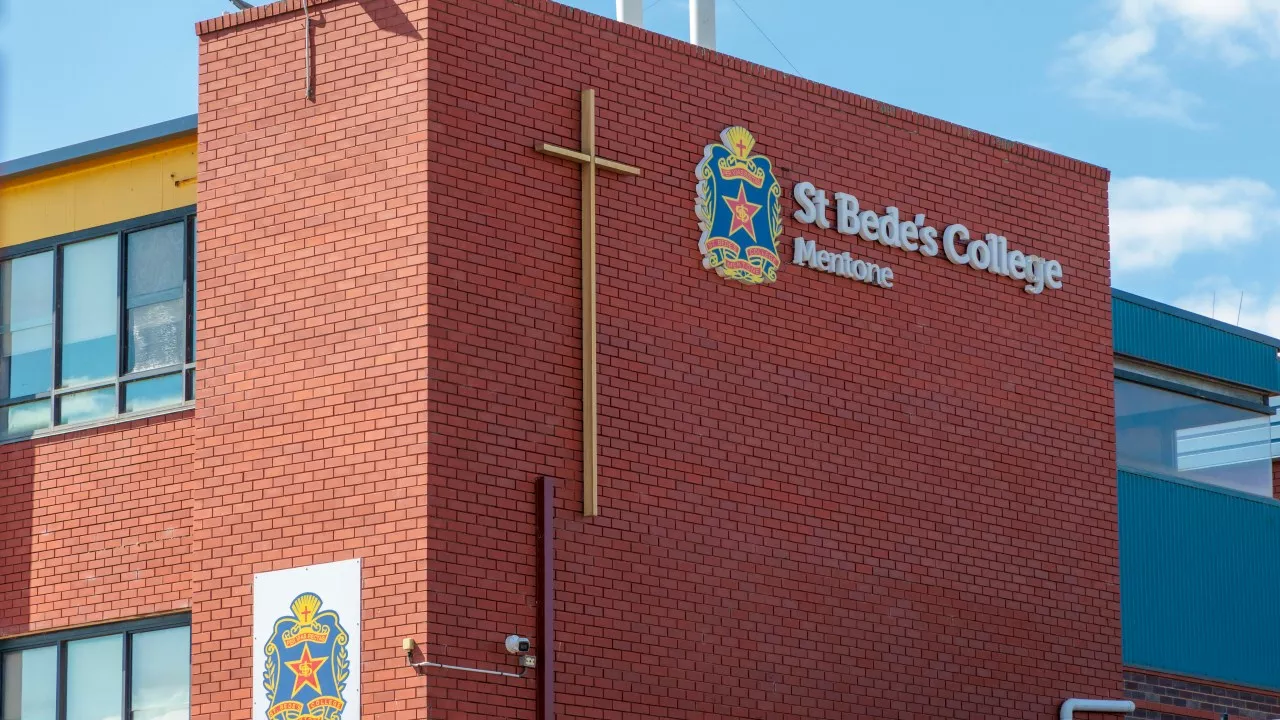 Catholic boys school in Melbourne sent into lockdown over social media threats