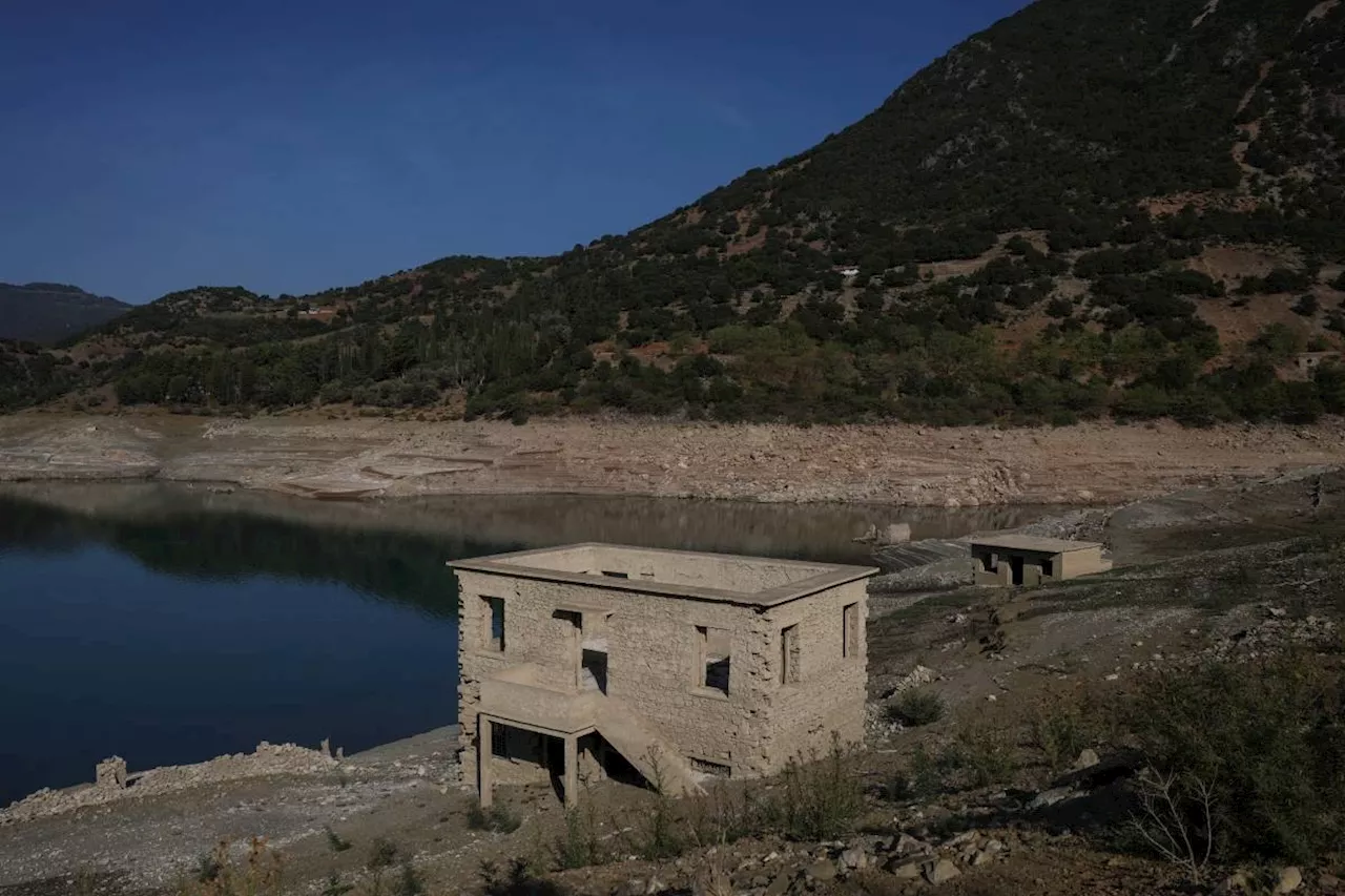 Sunken village emerges in Greece as drought dries up lake