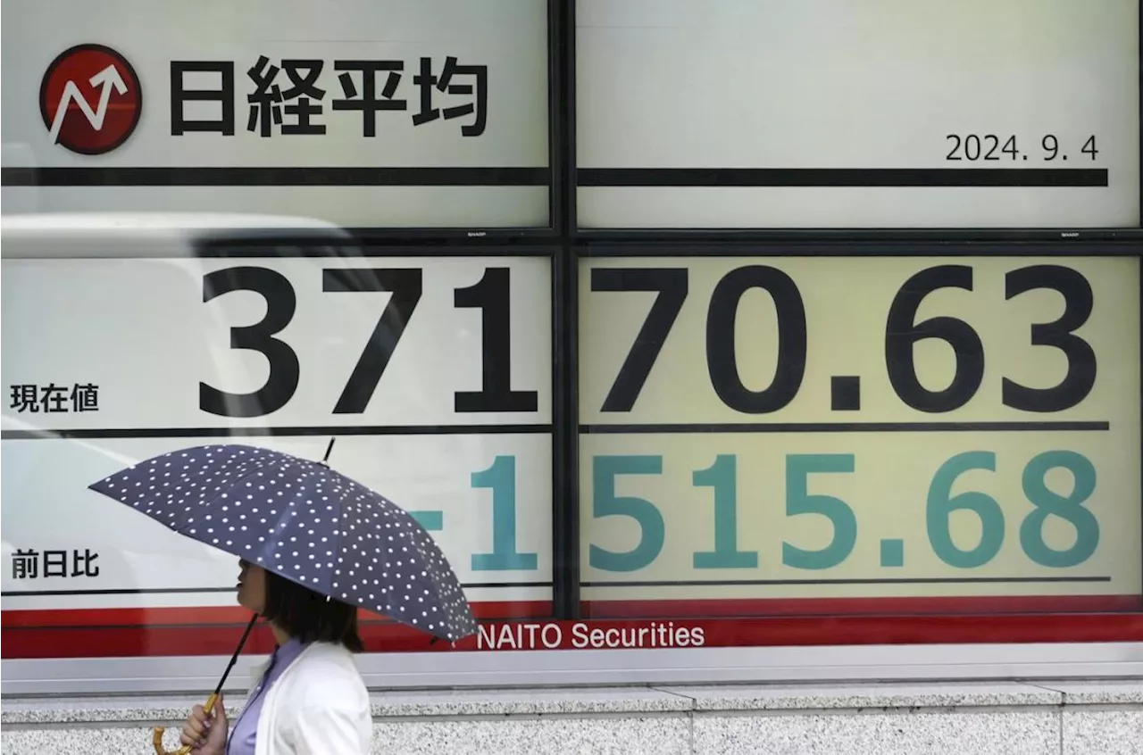 Asian stocks decline, following Wall Street's drop on worries about the economy