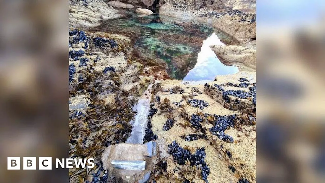 Concrete block found 'making dam' on Cornish beach