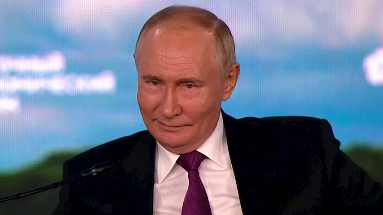 Smirking Vladimir Putin says he supports Kamala Harris