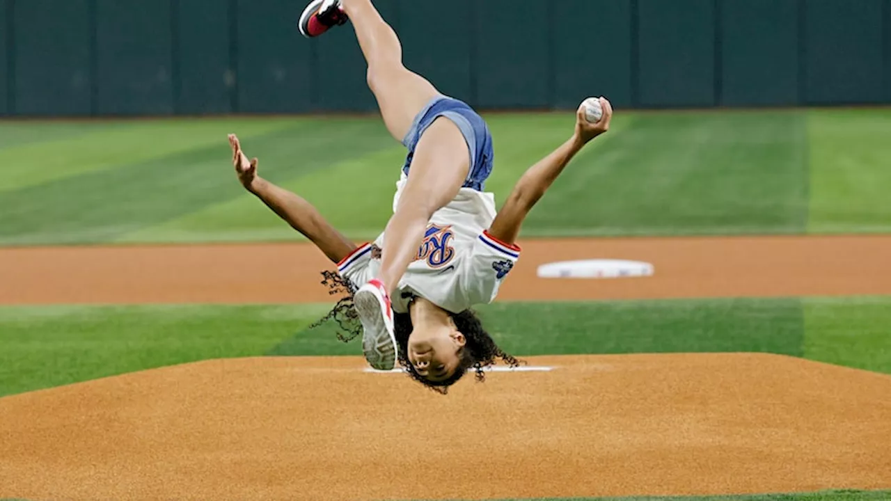 Gold medalist Hezly Rivera flips, throws Rangers' first pitch