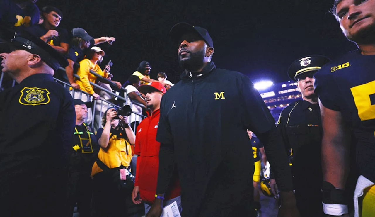 Michigan's Sherrone Moore has been coaching without a signed contract