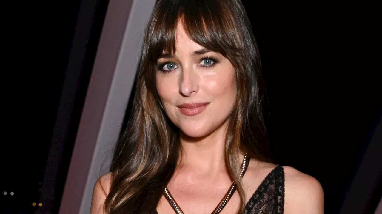 Dakota Johnson Paired a Sheer Lace Slip Dress With a Big Boho Amulet