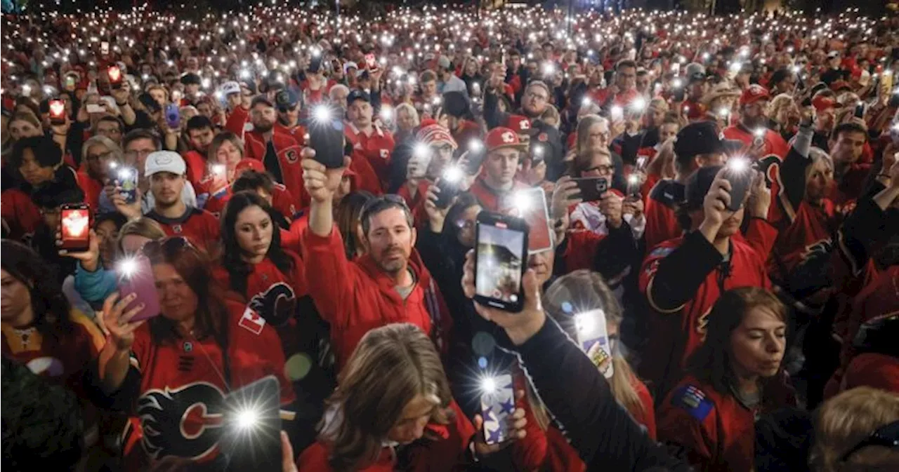 Flames fans, players remember Johnny and Matthew Gaudreau at vigil in Calgary